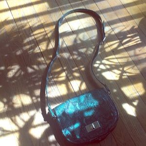 I am selling a snakes skin purse from Talbots.